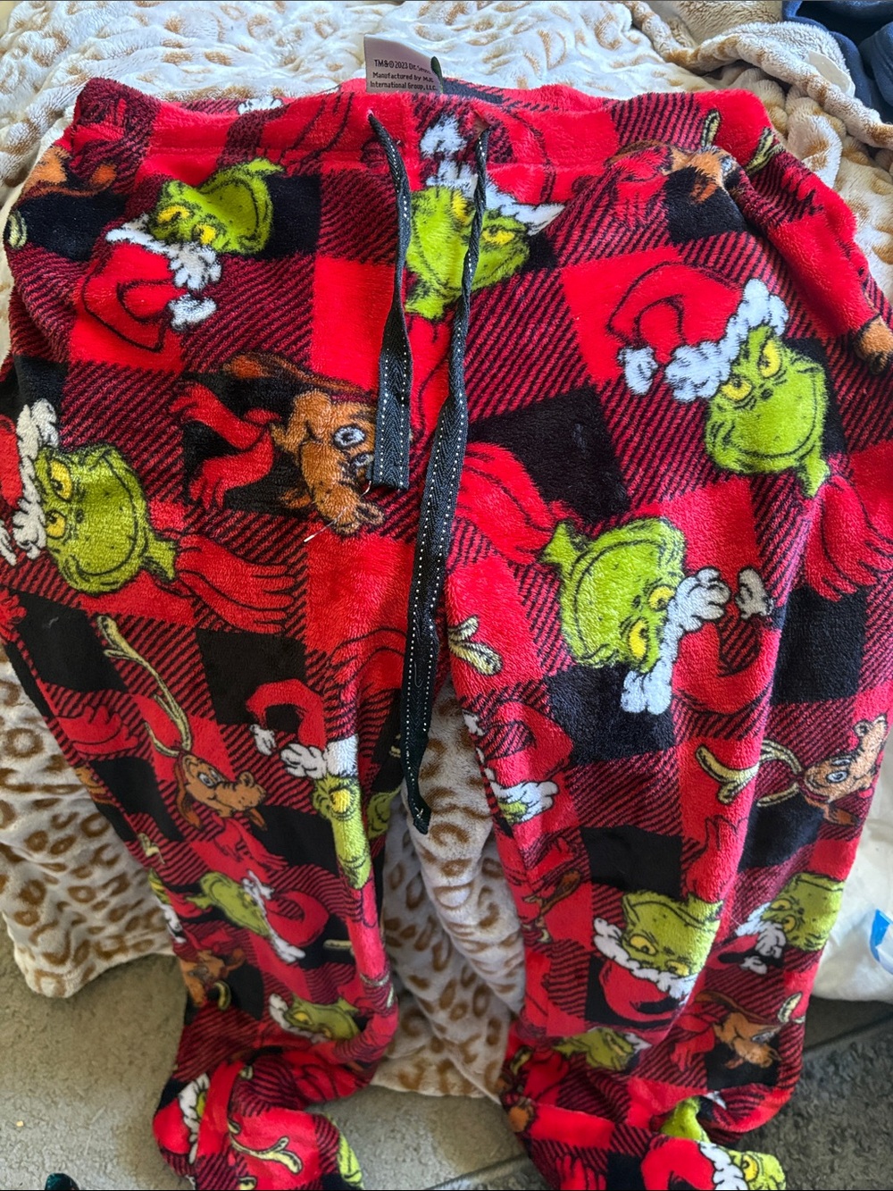 Women’s Red Grinch Plaid Fleece Pajama Pants